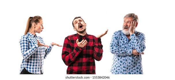 Family Members Arguing With One Another On White Studio Background. Concept Of Human Emotions, Expression, Conflict Of Generations. Woman And Men In Dispute. Half-length Portrait. Copyspace.