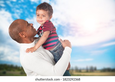 Family Members Hugging Each Other On The Nature Background