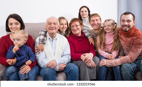 Family Members Making The Family Photo During Reunion Party 