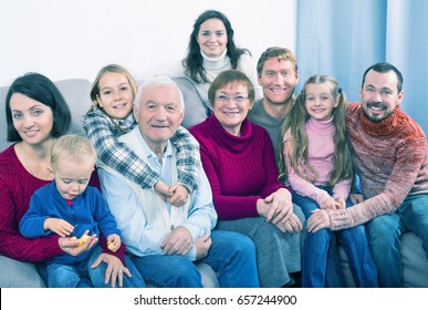 Family Members Making Family Photo During The Reunion Party