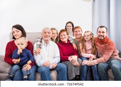 Family Members Making The Family Photo During A Reunion Party 