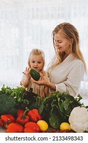 Family Mother And Child Girl Cooking Vegan Food Together Organic Vegetables Healthy Eating Sustainable Lifestyle Organic Farm Harvest Grocery Shopping 