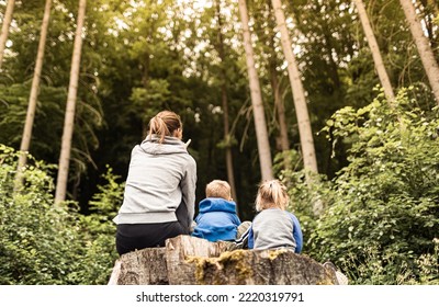 Family. Mother and children exploring nature forest  - Powered by Shutterstock