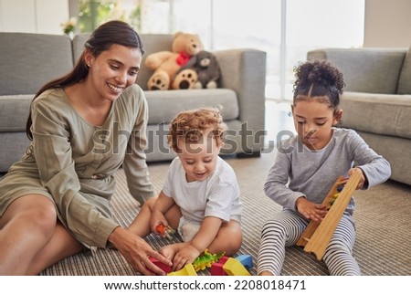 Family, mother and children playing with toys for development, education and childcare creative learning. Happy mom teaching and developing foster brother and sister siblings at home on a weekend