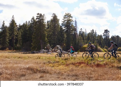 Family Mountain Biking In Countryside, California