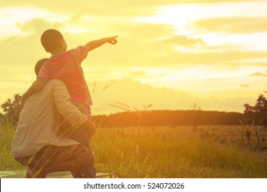 Family With Mountain View,Or Father And Son Are Happy With Travel And Picnic With Mountain And Sunshine View.