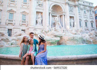 Family Near Fontana Di Trevi, Rome, Italy. Happy Father And Kids Enjoy Italian Vacation Holiday In Europe.