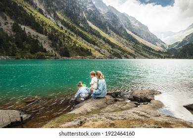 Family Near A French Lake Gaube At The High Pyrenees