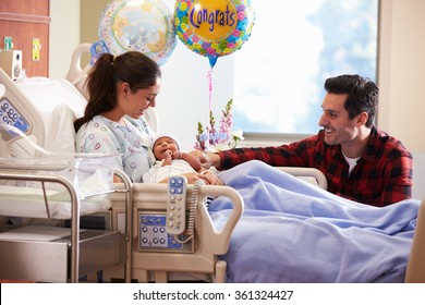 Family With New Born Baby In Post Natal Hospital Department - Powered by Shutterstock