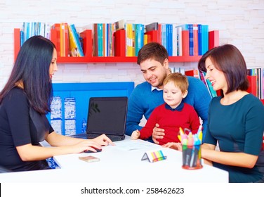 family in office, at the professional