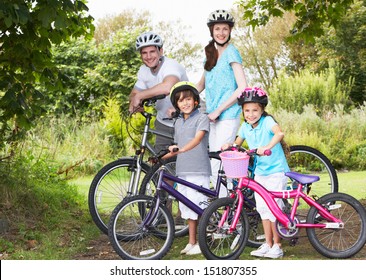 Family On Cycle Ride In Countryside