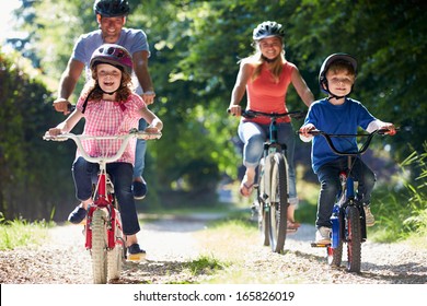 Family On Cycle Ride In Countryside