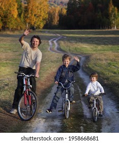 Family On Cycle Ride In Countryside Enjoying A Bike Trip