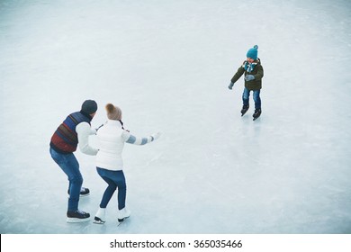 Family On Skating Rink