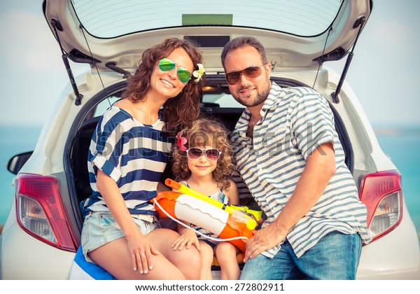 Family\
on vacation. Summer holiday and car travel\
concept