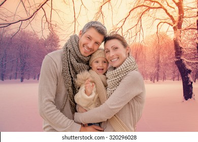 family outdoors in winter landscape