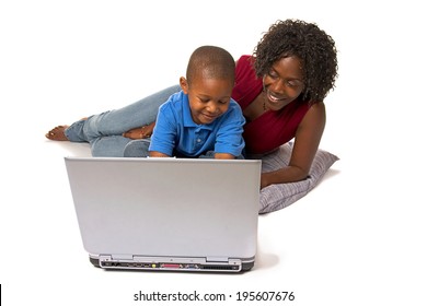 Family: Parent Helping Child Learn About Computer