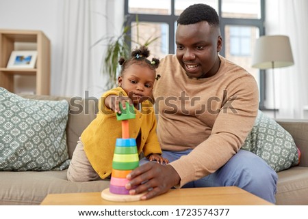 Similar – Image, Stock Photo Happy child playing with kitten outdoor