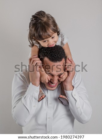 family, parenthood, people and parenthood concept - happy smiling young father with little son at home