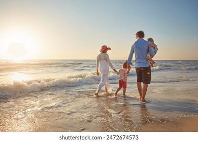 Family, parents and children on beach trip for holiday fun, vacation and adventure with love. Couple, man and woman and kids on seashore walking with sunset for summer break, support and back view - Powered by Shutterstock