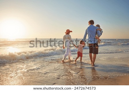 Family, parents and children on beach trip for holiday fun, vacation and adventure with love. Couple, man and woman and kids on seashore walking with sunset for summer break, support and back view