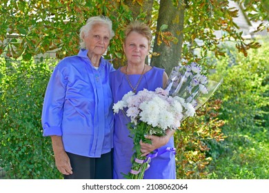 Family Photo Session Elderly Mother And Daughter.