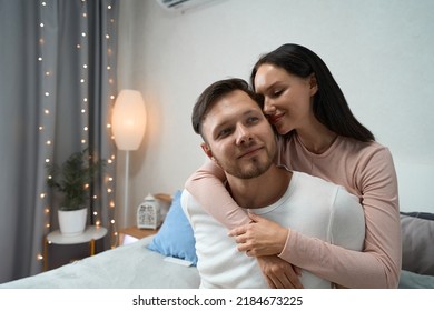 Family Photo Session Of A Young Couple In The Bedroom