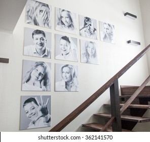 Family Photos On The Wall. Portraits Of Family Stairwell