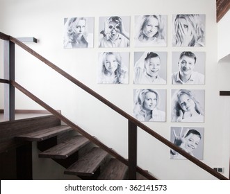 Family Photos On The Wall. Portraits Of Family Stairwell