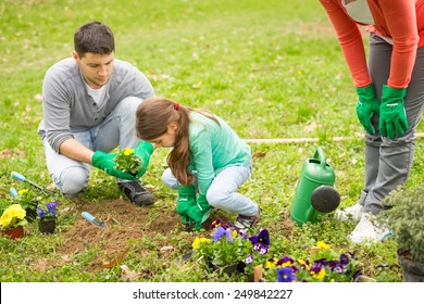 Family Planting Flowers