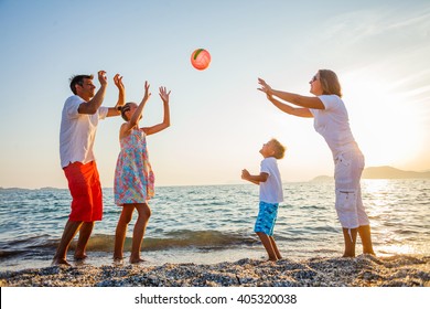 Family play on beach
