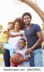 Family Playing Basketball Together