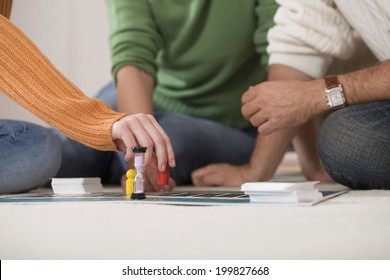 Family Playing Board Game