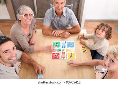 Family Playing Board Games.