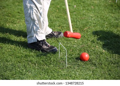 Family Playing Croquet