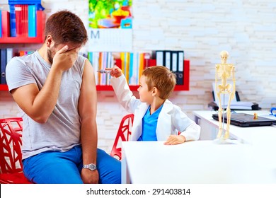 Family Playing In Doctor And Patient, Father Scared Of Injection