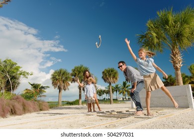 Family Playing Horseshoe Game, Providenciales, Turks And Caicos Islands, Caribbean