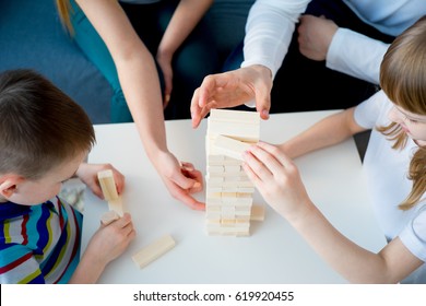 Family Playing Jenga