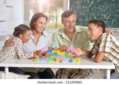 Family Playing Lego Game