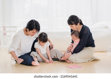 Family playing origami at home