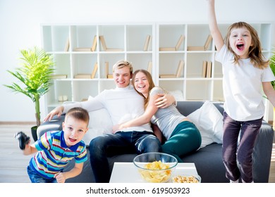 Family Playing Playstation