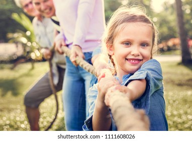 Family Playing Tug Of War