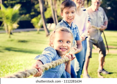 Family Playing Tug Of War