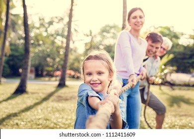 Family Playing Tug Of War