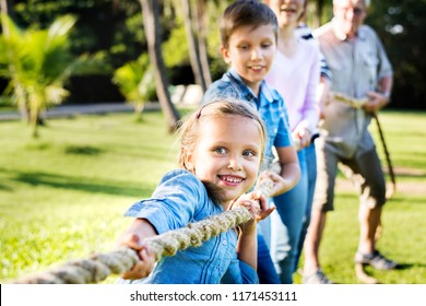 Family Playing Tug Of War