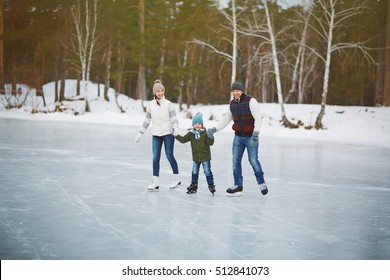 Family Portrait On Skating Rink