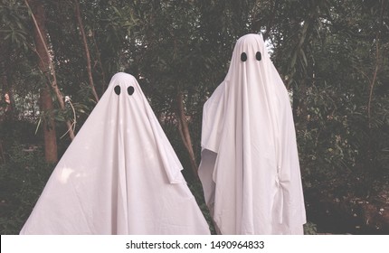 family-portrait-two-ghosts-woods-260nw-1490964833.jpg