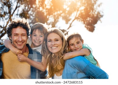 Family portrait, walking and piggyback for kids with parents in a park with love, games and fun bonding in nature. Support, playing and people in a forest for back ride, travel and trust on vacation - Powered by Shutterstock