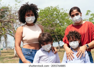 Family With Protective Mask In The Park