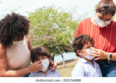 Family With Protective Mask In The Park